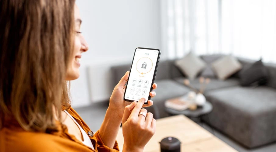 Woman setting network security features on internet device