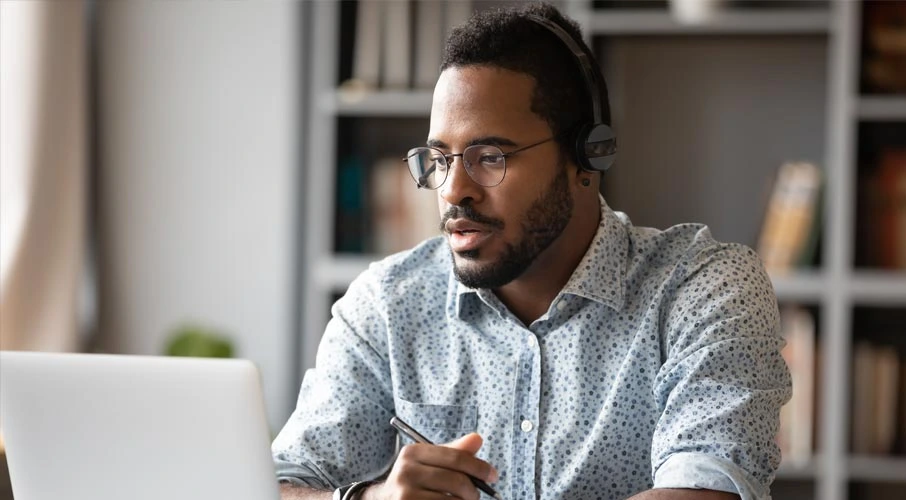 Man using internet to work from home
