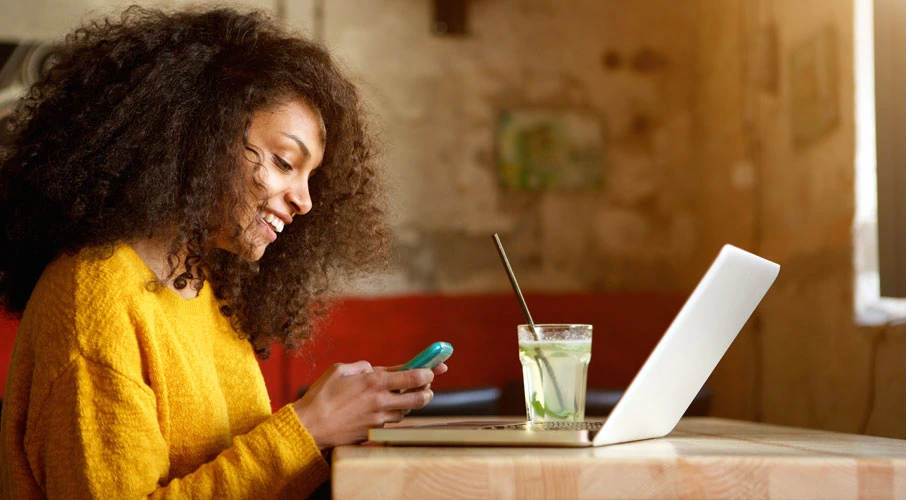 Woman using mobile hotspot for devices