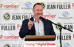 Joe Gamble, Senior Vice President, West Region commemorates the opening of a new computer lab and installation of a Wi-Fi hotspot at the Boys and Girls Clubs of the Sequoias on June 22nd.